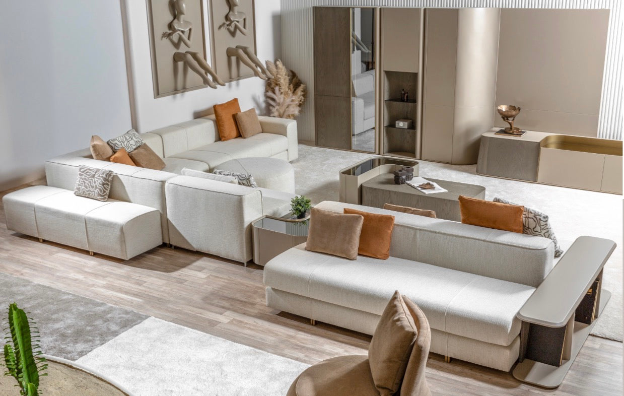 Stoneveil luxury furniture collection featuring modular sofa seating, modern dining table, sculptural accent chairs, luxury bedroom design, and illuminated walk in wardrobe.