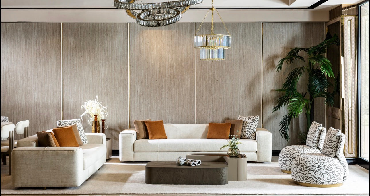 Stoneveil luxury furniture collection featuring modular sofa seating, modern dining table, sculptural accent chairs, luxury bedroom design, and illuminated walk in wardrobe.