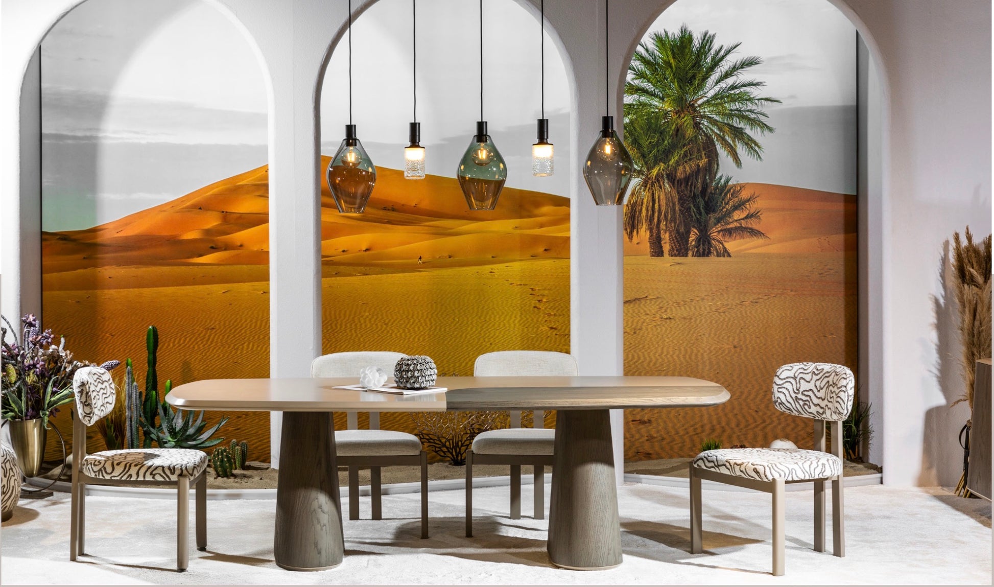 Stoneveil luxury furniture collection featuring modular sofa seating, modern dining table, sculptural accent chairs, luxury bedroom design, and illuminated walk in wardrobe.