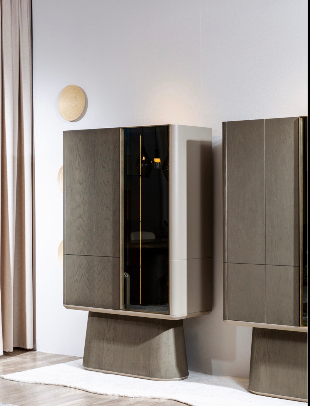 Stoneveil luxury furniture collection featuring modular sofa seating, modern dining table, sculptural accent chairs, luxury bedroom design, and illuminated walk in wardrobe.