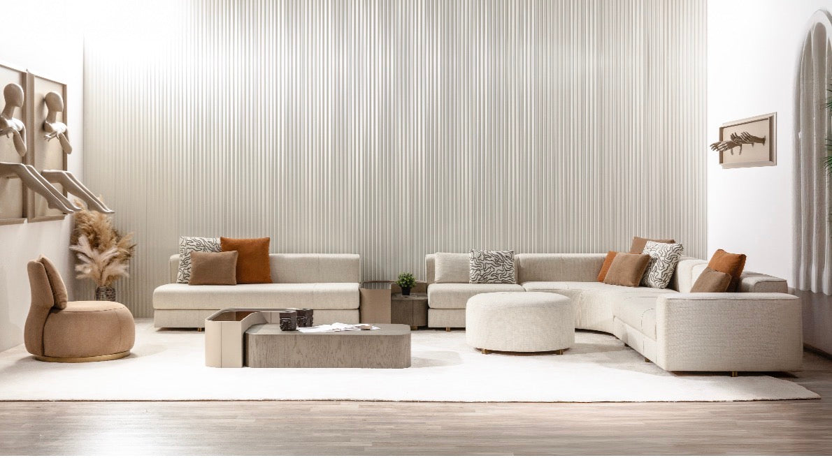 Stoneveil luxury furniture collection featuring modular sofa seating, modern dining table, sculptural accent chairs, luxury bedroom design, and illuminated walk in wardrobe.