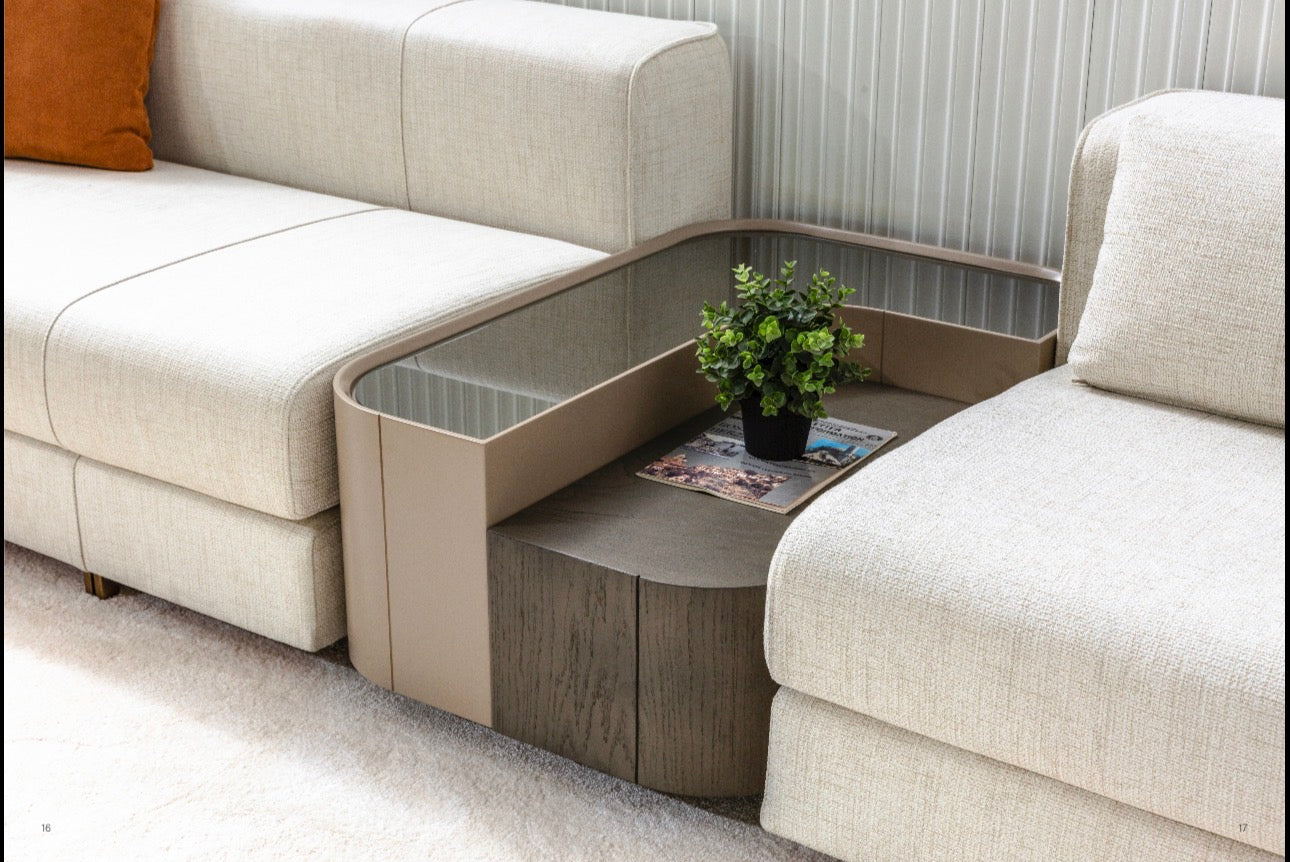 Stoneveil luxury furniture collection featuring modular sofa seating, modern dining table, sculptural accent chairs, luxury bedroom design, and illuminated walk in wardrobe.