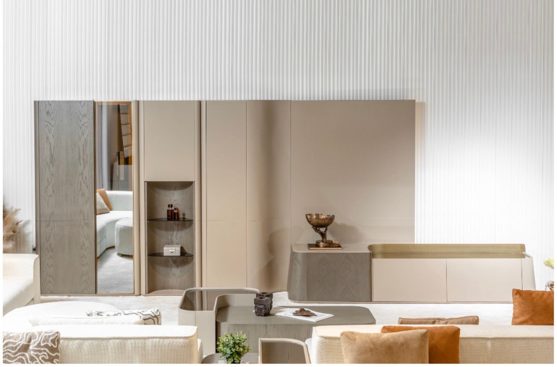 Stoneveil luxury furniture collection featuring modular sofa seating, modern dining table, sculptural accent chairs, luxury bedroom design, and illuminated walk in wardrobe.