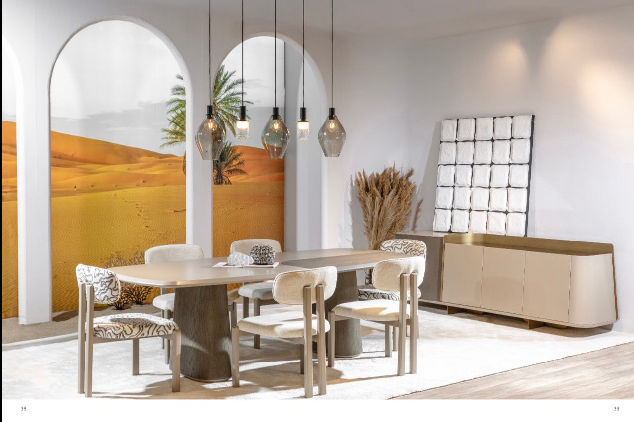 Stoneveil luxury furniture collection featuring modular sofa seating, modern dining table, sculptural accent chairs, luxury bedroom design, and illuminated walk in wardrobe.