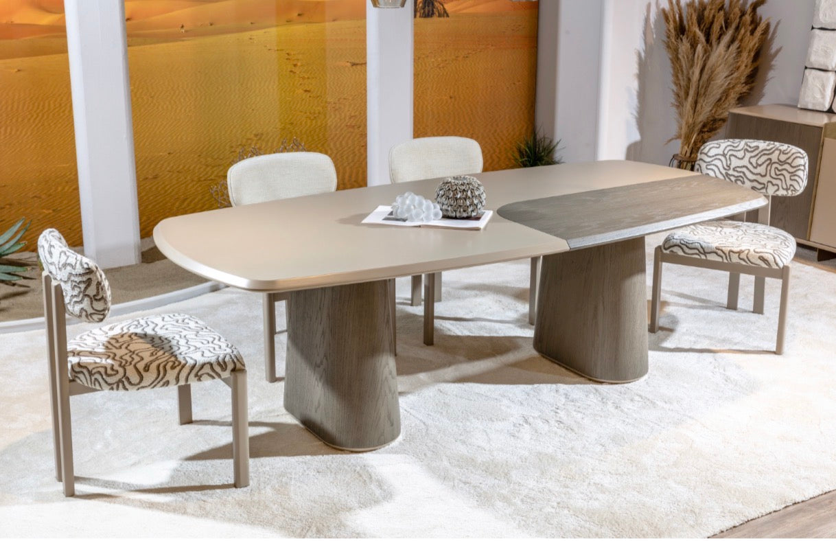 Stoneveil luxury furniture collection featuring modular sofa seating, modern dining table, sculptural accent chairs, luxury bedroom design, and illuminated walk in wardrobe.