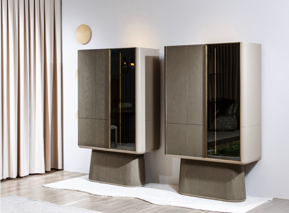 Stoneveil luxury furniture collection featuring modular sofa seating, modern dining table, sculptural accent chairs, luxury bedroom design, and illuminated walk in wardrobe.