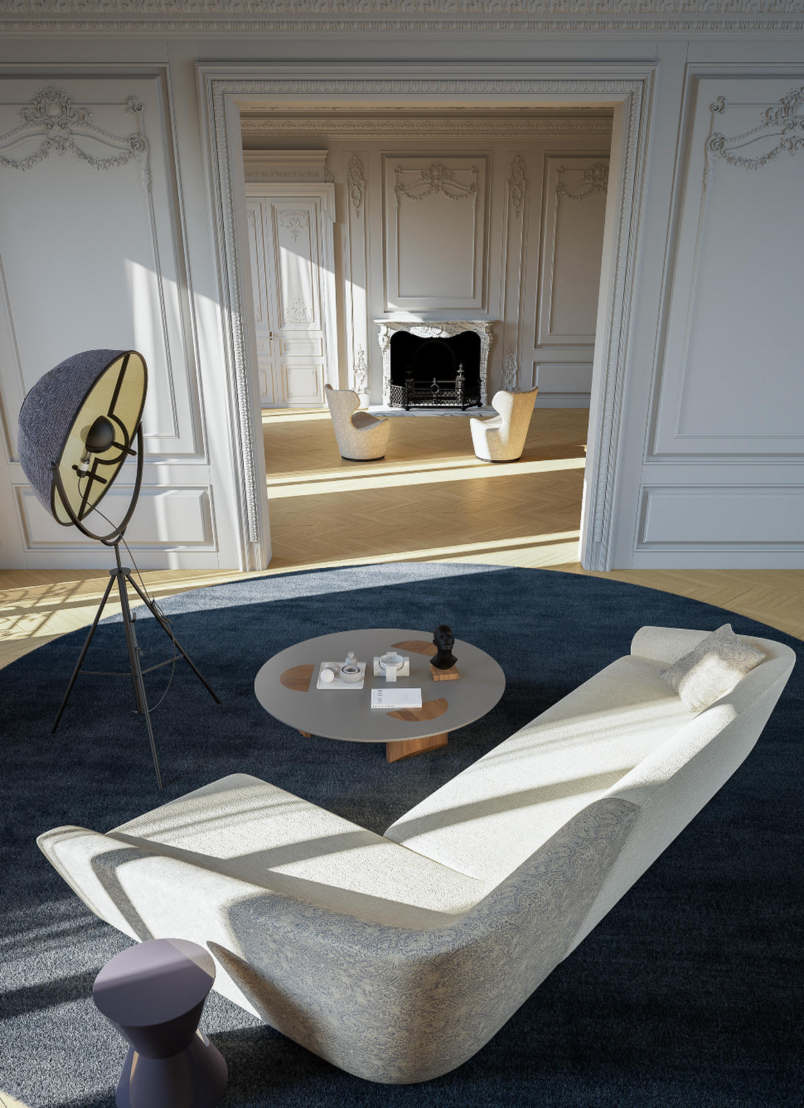 Overtime luxury furniture collection featuring curved sofa, sculptural lounge chairs, modern coffee table, and classic architectural interior setting.