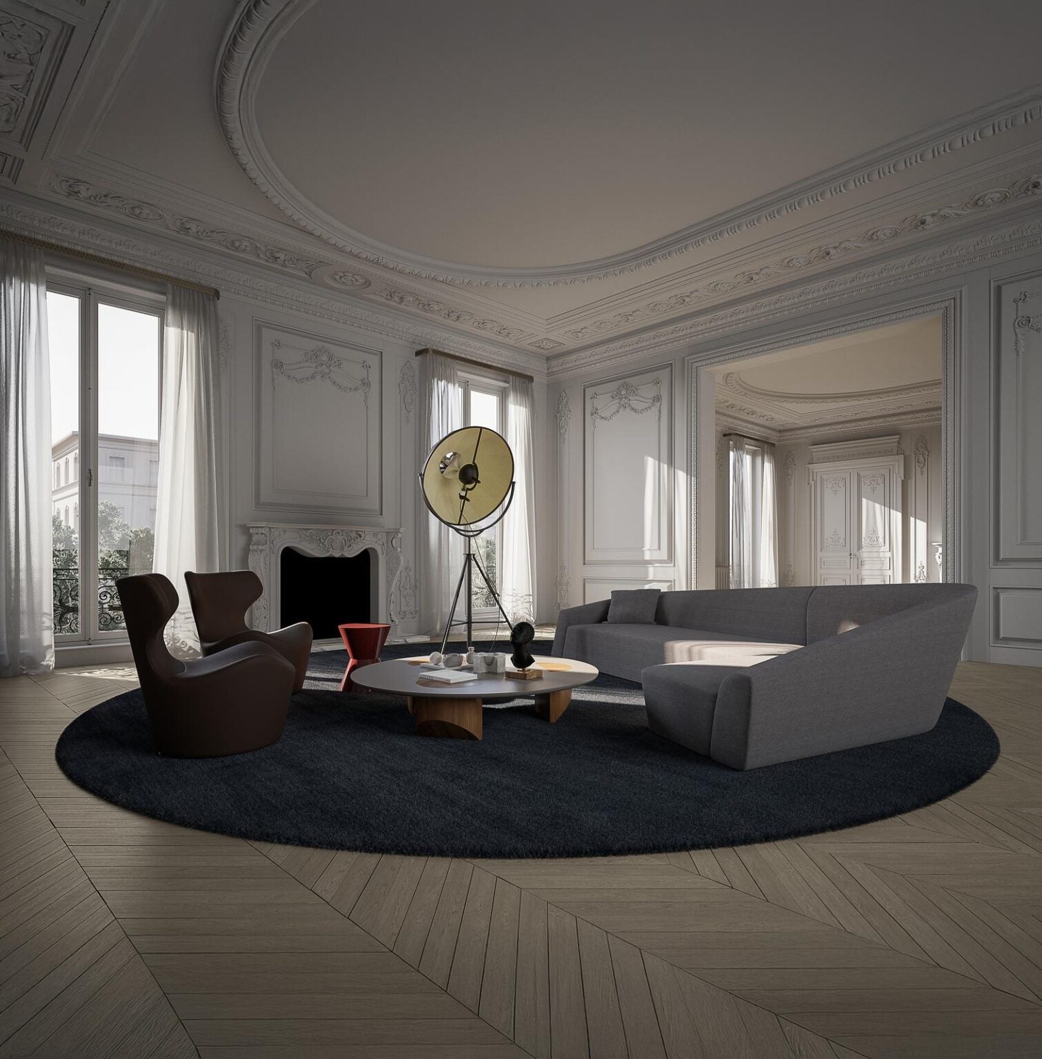 Overtime luxury furniture collection featuring curved sofa, sculptural lounge chairs, modern coffee table, and classic architectural interior setting.