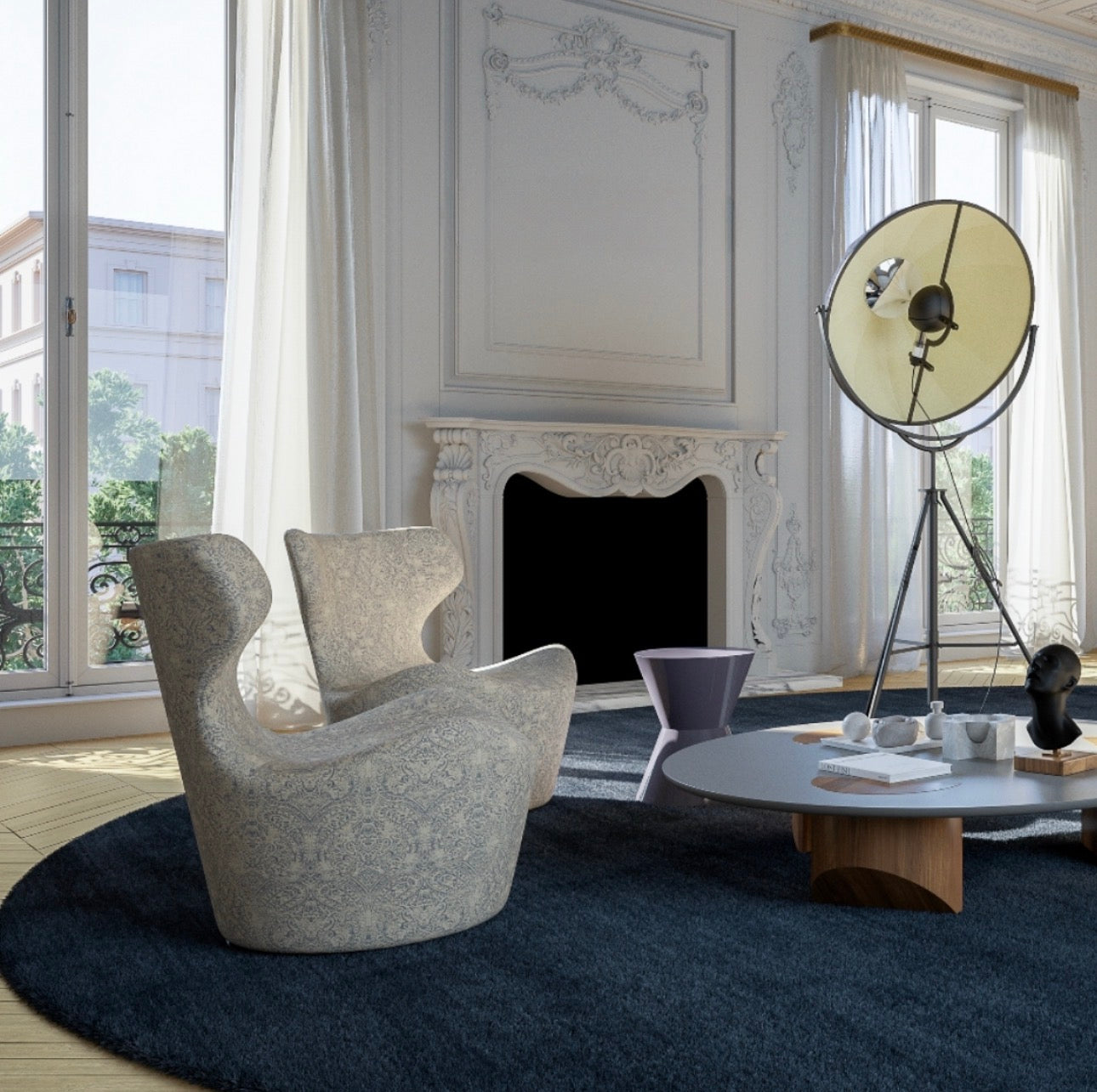 Overtime luxury furniture collection featuring curved sofa, sculptural lounge chairs, modern coffee table, and classic architectural interior setting.