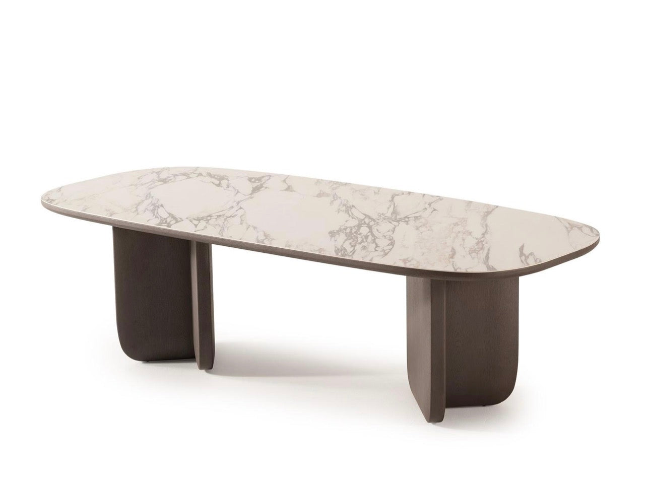 Urbane modern luxury furniture collection featuring sculptural dining table, curved bedroom furniture, and terracotta lacquer accents.