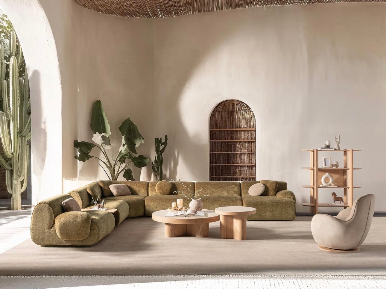 Lumen modern organic living room collection with curved sectional sofa, natural wood coffee tables, and warm minimalist interior design.