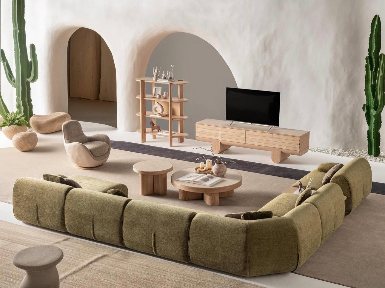 Lumen modern organic living room collection with curved sectional sofa, natural wood coffee tables, and warm minimalist interior design.