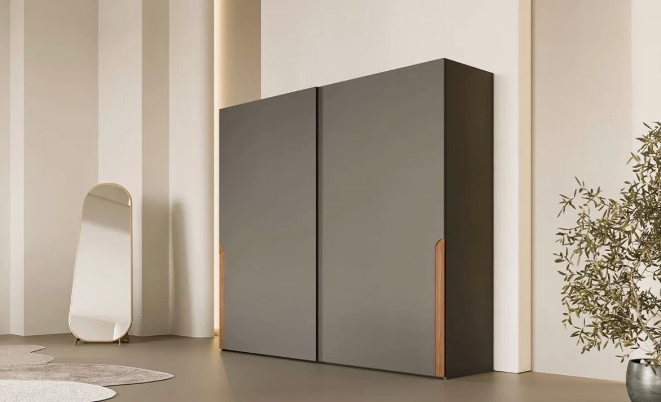 Evening luxury bedroom collection featuring sculptural wood bed, modern nightstands, minimalist wardrobe, and contemporary bedroom design.