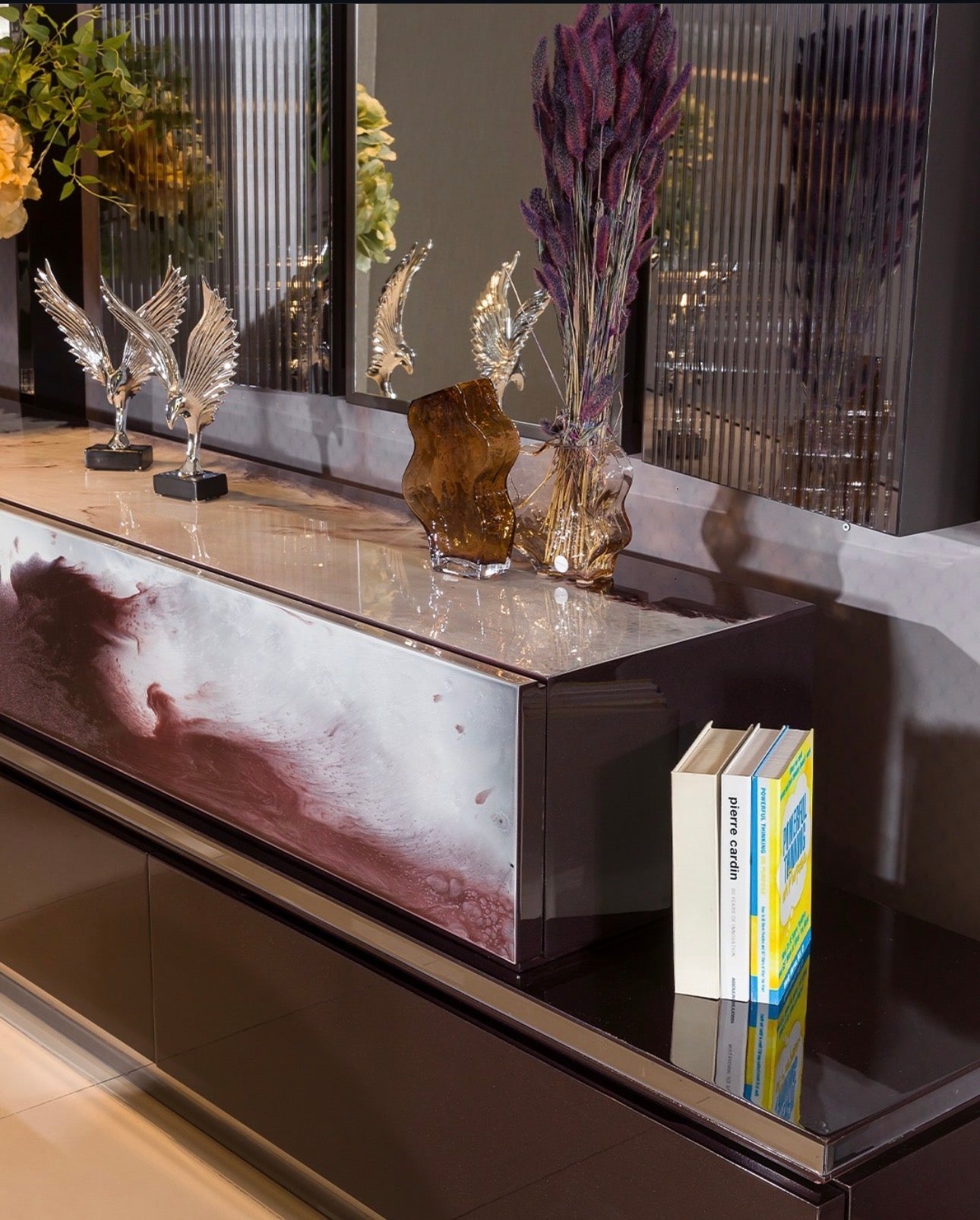 Forge luxury furniture collection featuring dramatic dining set, modern chandelier, and deep espresso contemporary living room furniture.