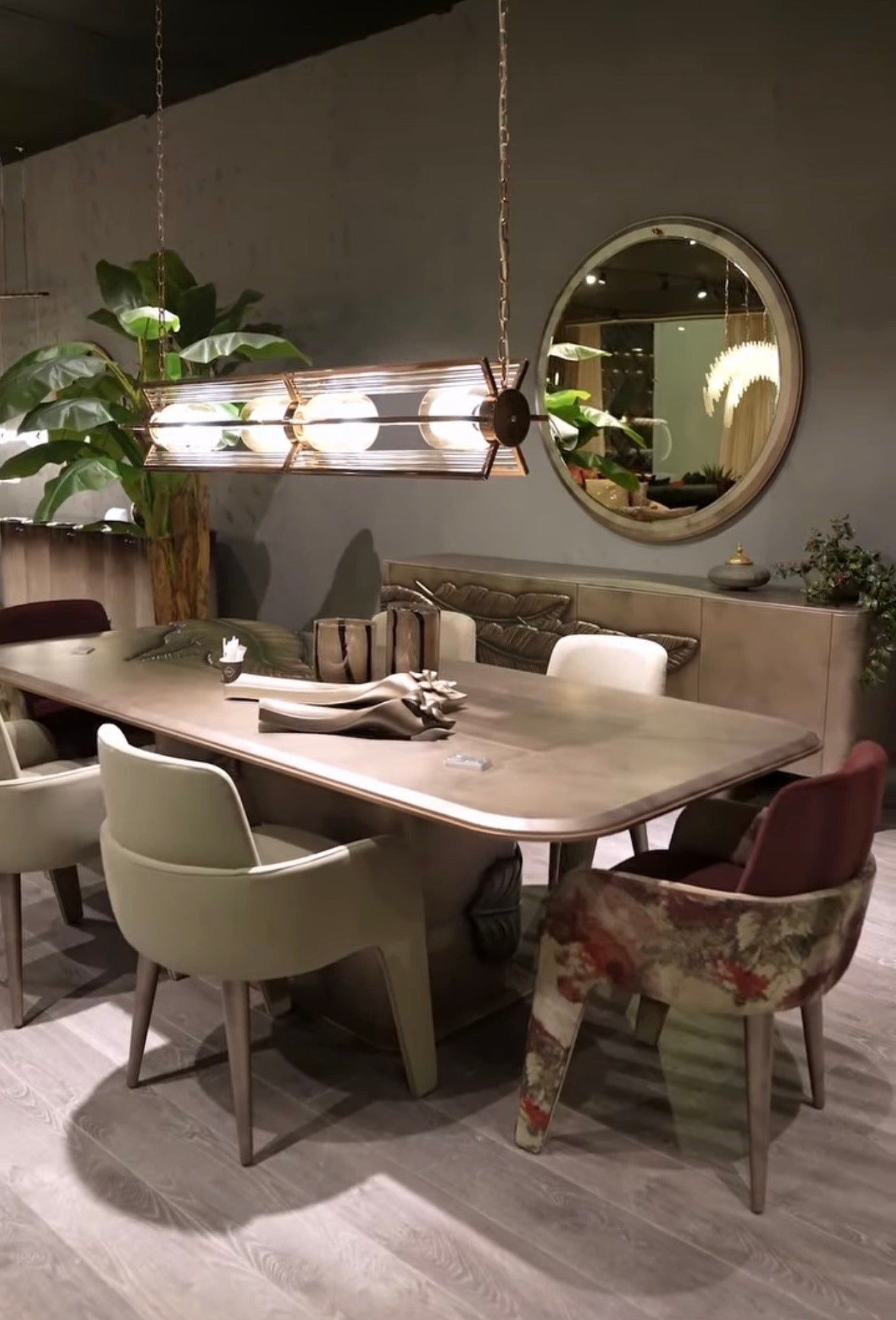 Blush luxury furniture collection featuring sculptural sofa, bronze leaf coffee table, modern dining set, and warm contemporary living room design.