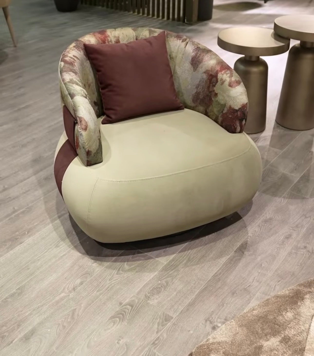 Blush luxury furniture collection featuring sculptural sofa, bronze leaf coffee table, modern dining set, and warm contemporary living room design.