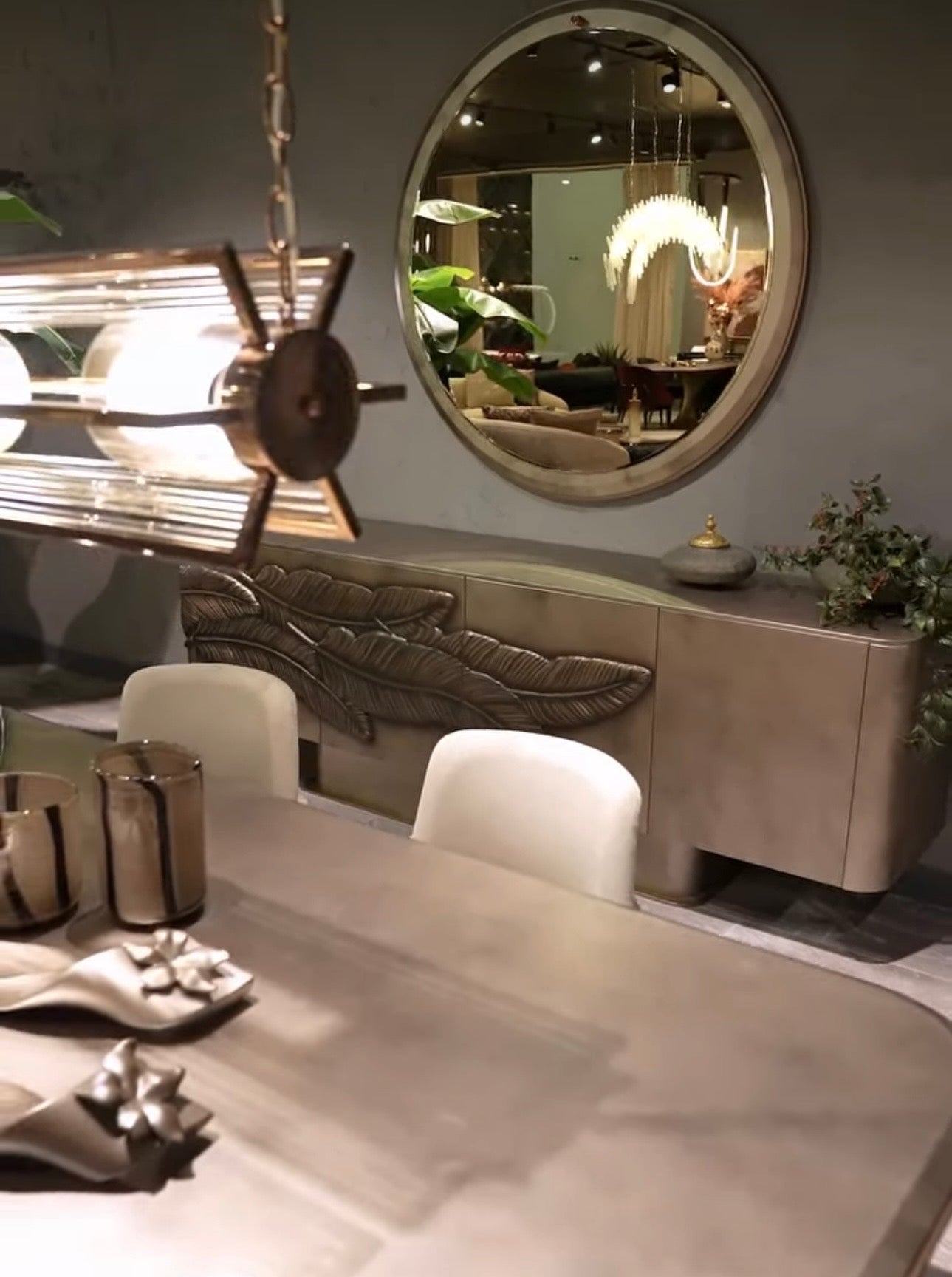 Blush luxury furniture collection featuring sculptural sofa, bronze leaf coffee table, modern dining set, and warm contemporary living room design.