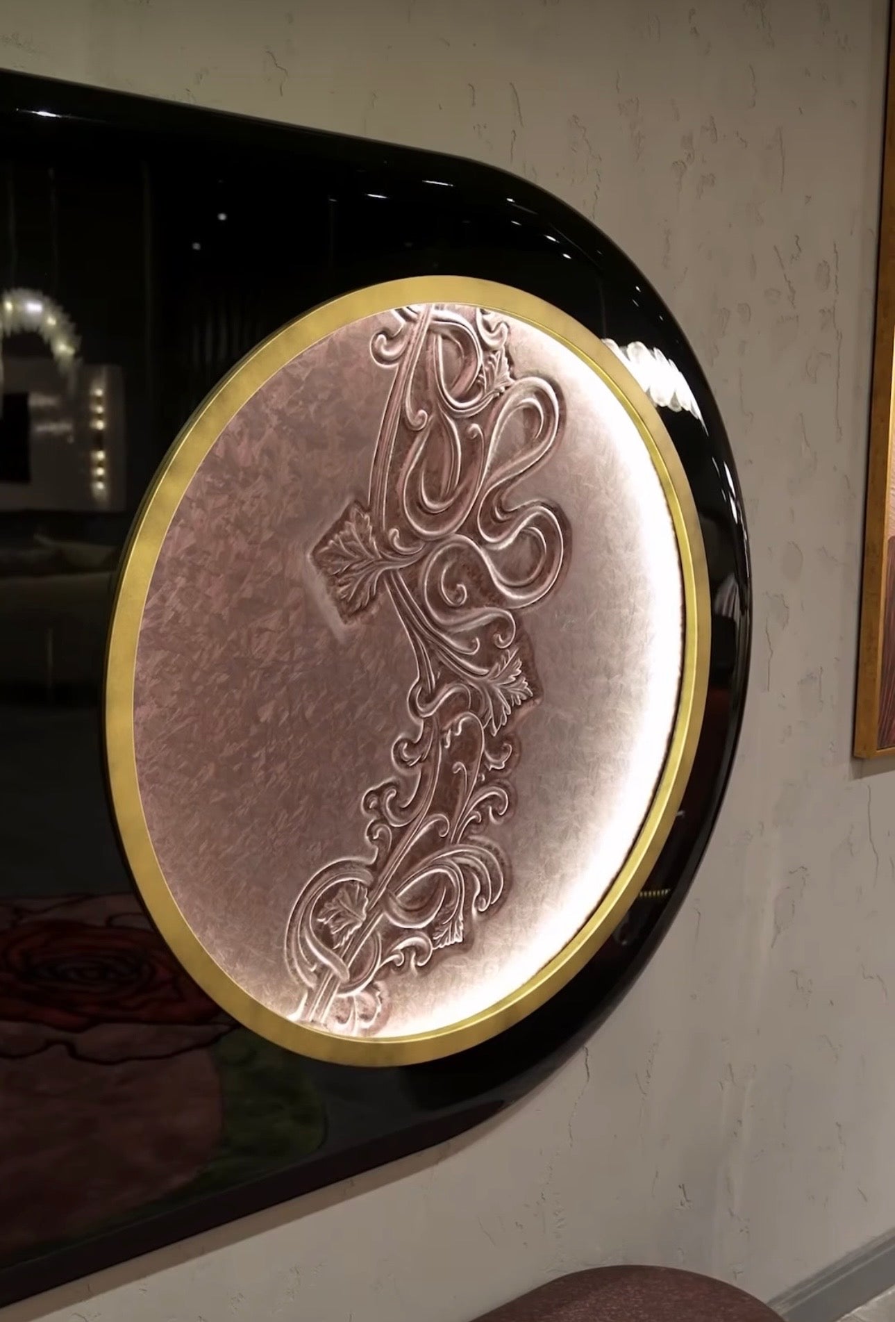 Noir luxury furniture collection with black velvet sofas, copper dining table, sculptural lighting, and dramatic modern interior styling.