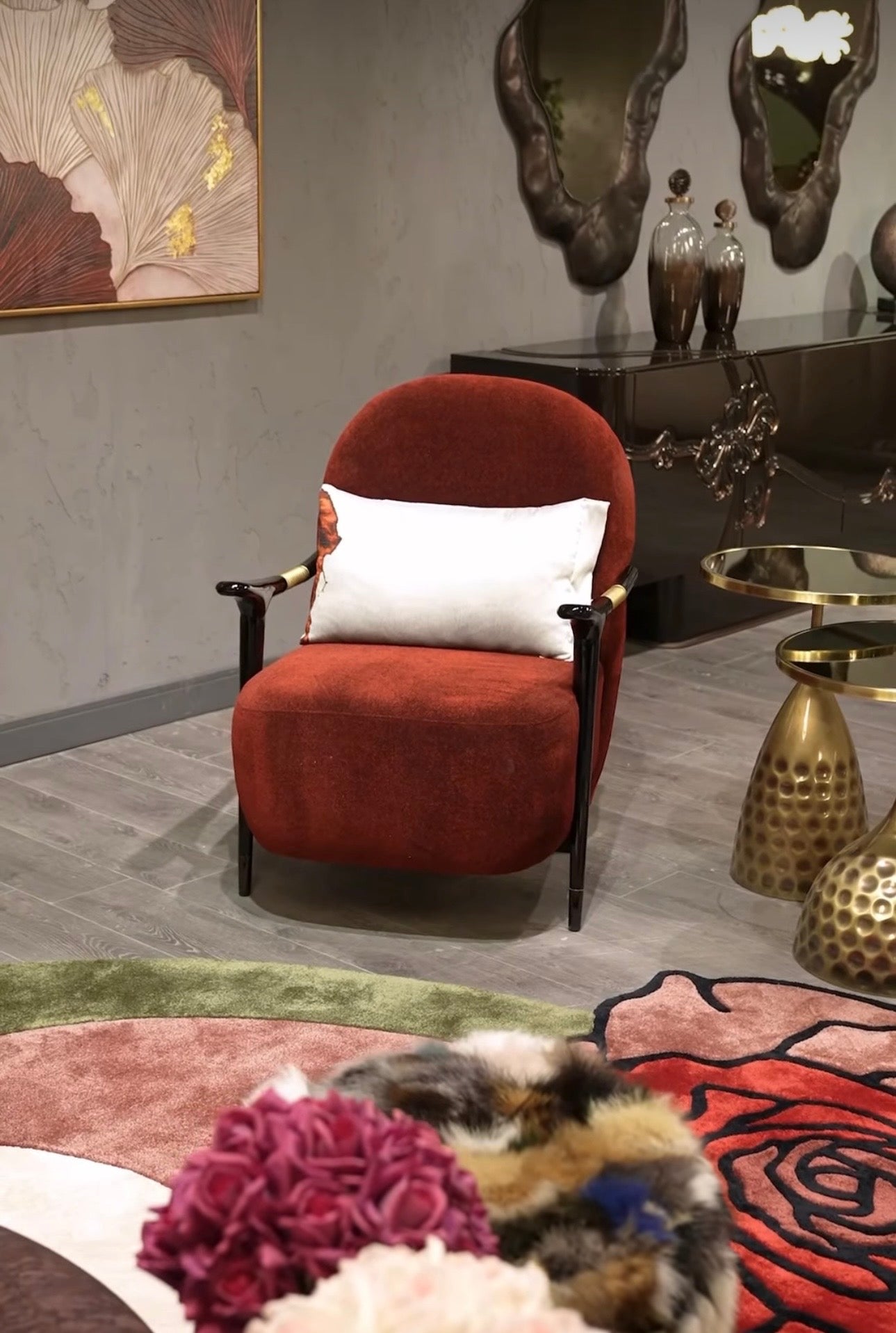 Noir luxury furniture collection with black velvet sofas, copper dining table, sculptural lighting, and dramatic modern interior styling.