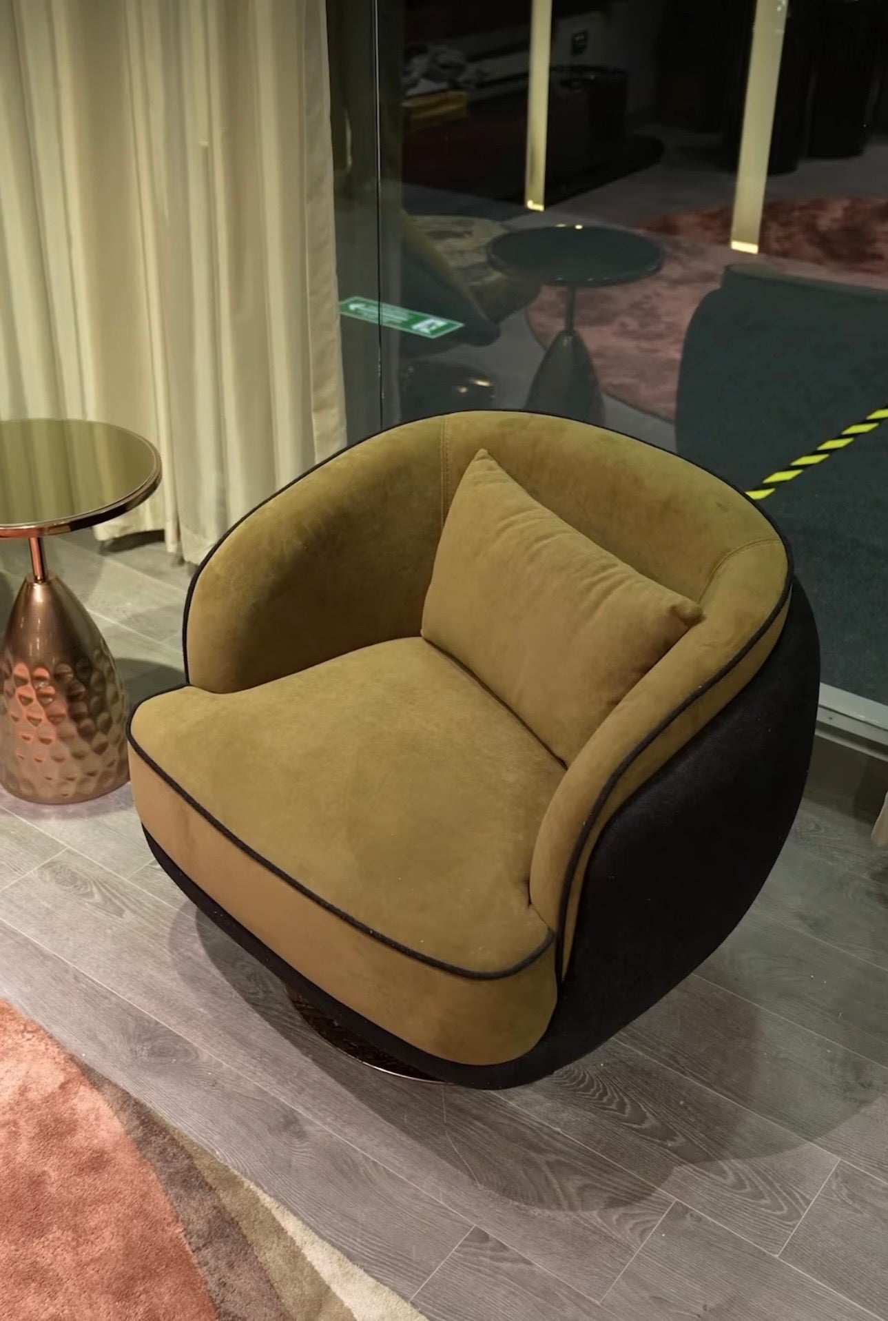 Inferno luxury furniture collection with curved sectional sofa, sculptural dining table, and artistic patterned upholstery.