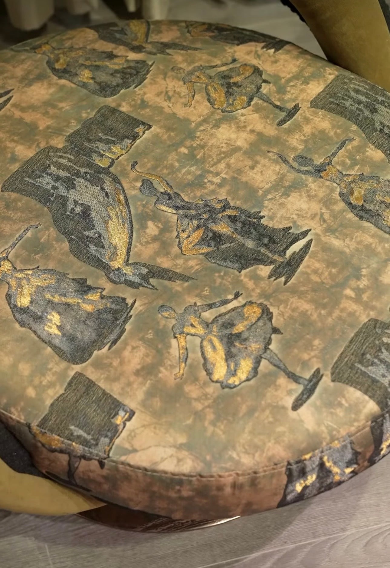 Inferno luxury furniture collection with curved sectional sofa, sculptural dining table, and artistic patterned upholstery.