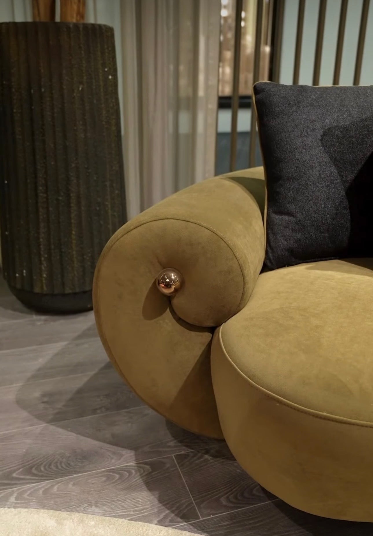 Inferno luxury furniture collection with curved sectional sofa, sculptural dining table, and artistic patterned upholstery.