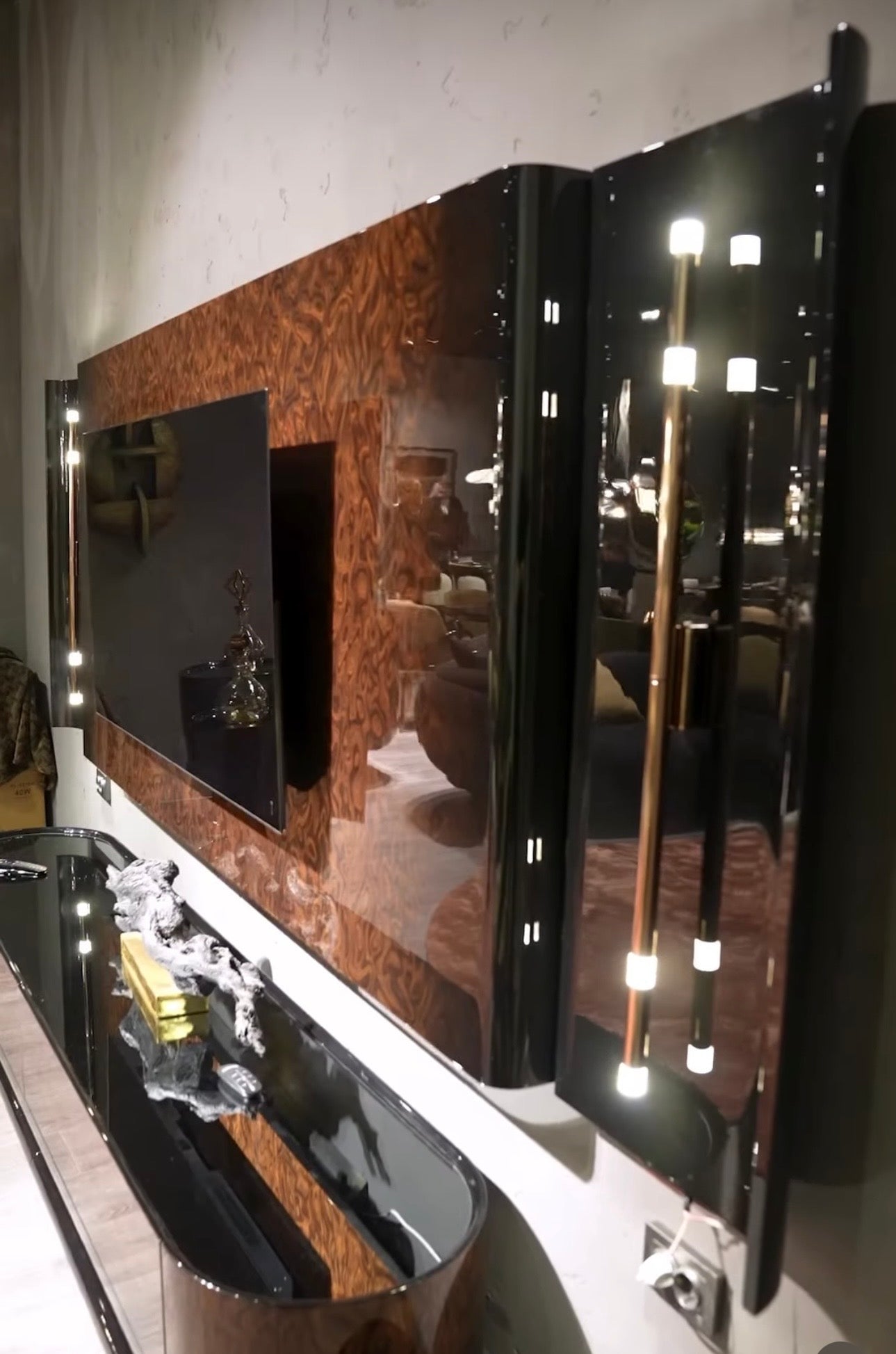 Inferno luxury furniture collection with curved sectional sofa, sculptural dining table, and artistic patterned upholstery.