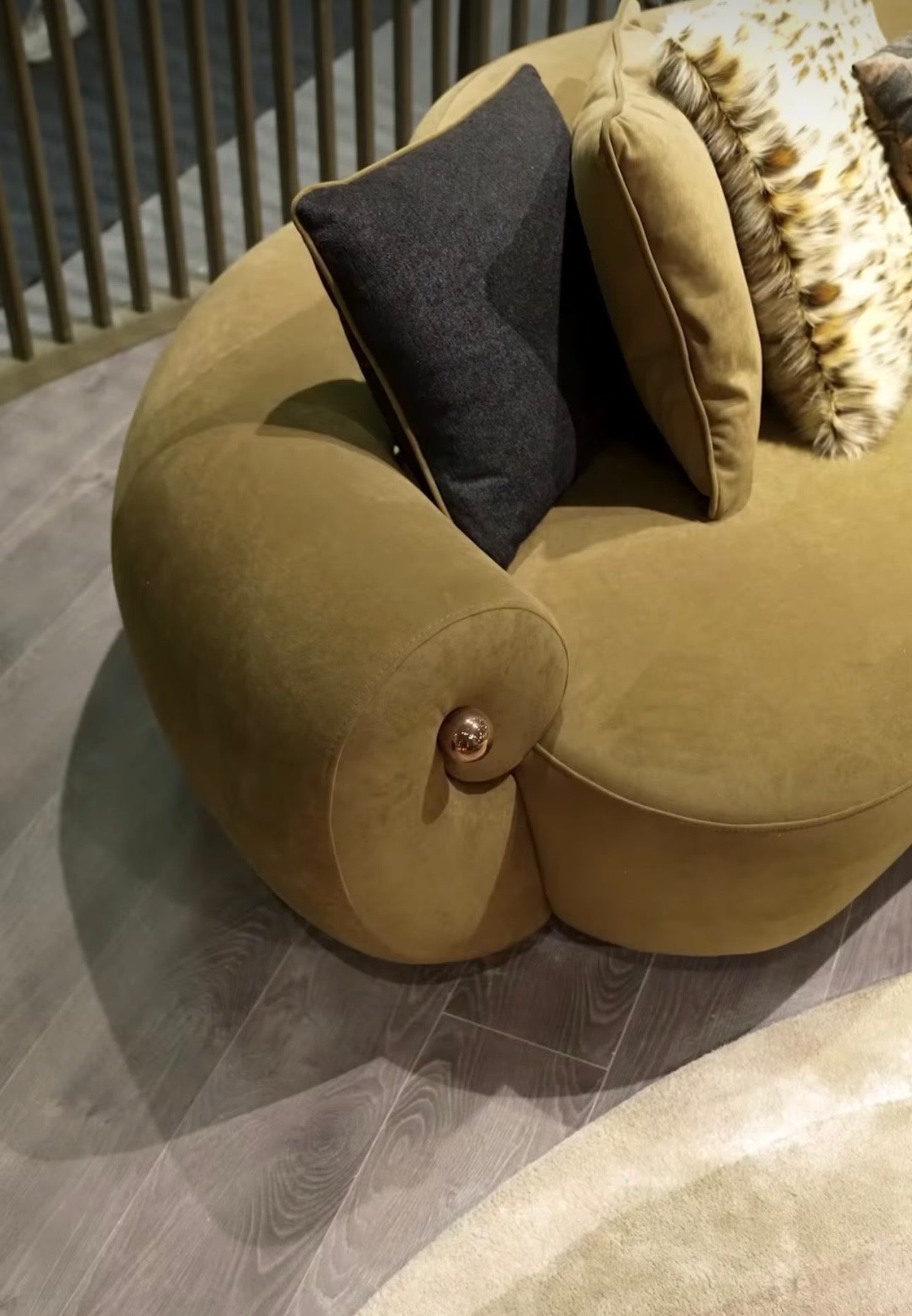 Inferno luxury furniture collection with curved sectional sofa, sculptural dining table, and artistic patterned upholstery.