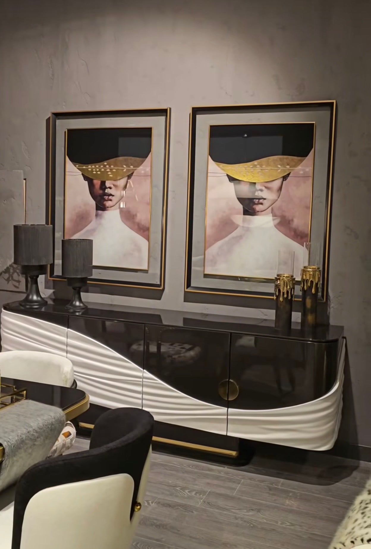 Monochrome modern luxury furniture collection featuring ivory curved sofa, black lacquer tables, and gold accent dining furniture.