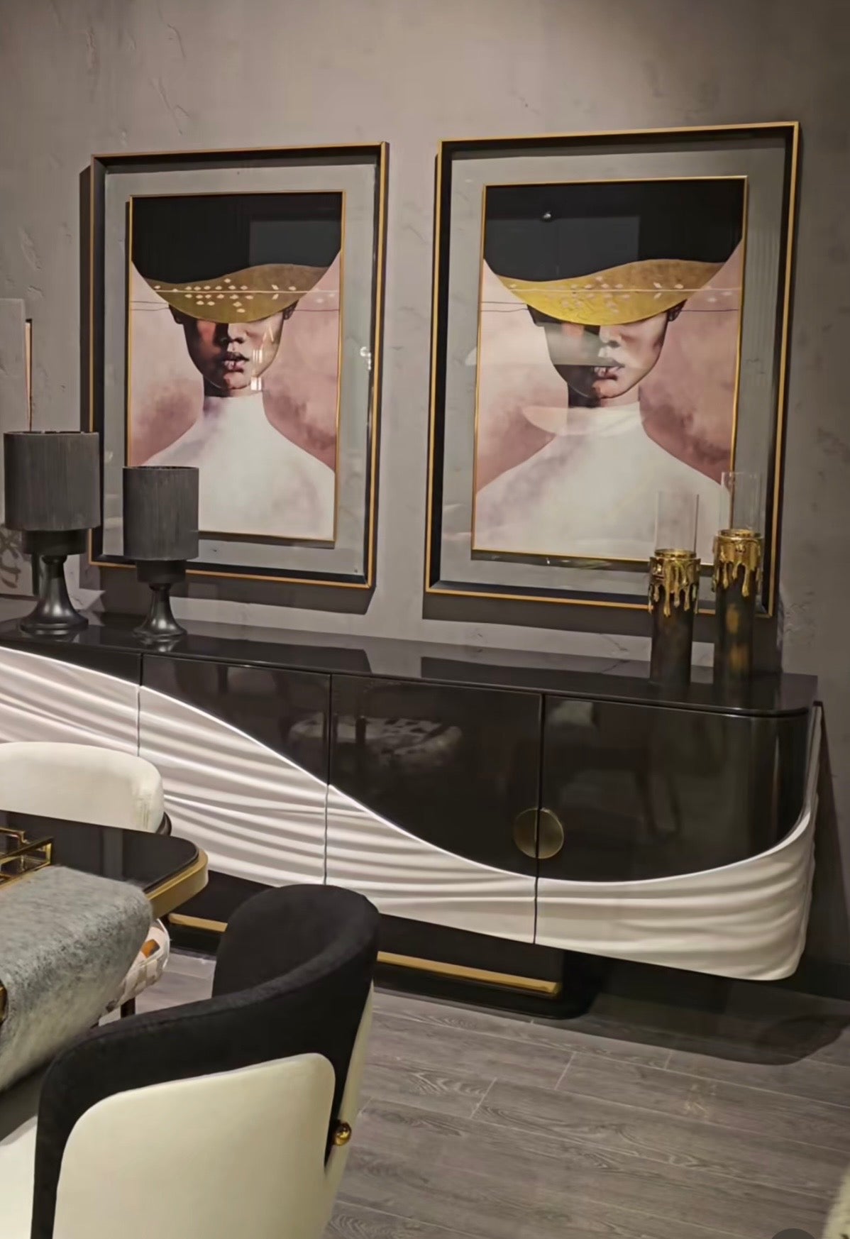 Monochrome modern luxury furniture collection featuring ivory curved sofa, black lacquer tables, and gold accent dining furniture.