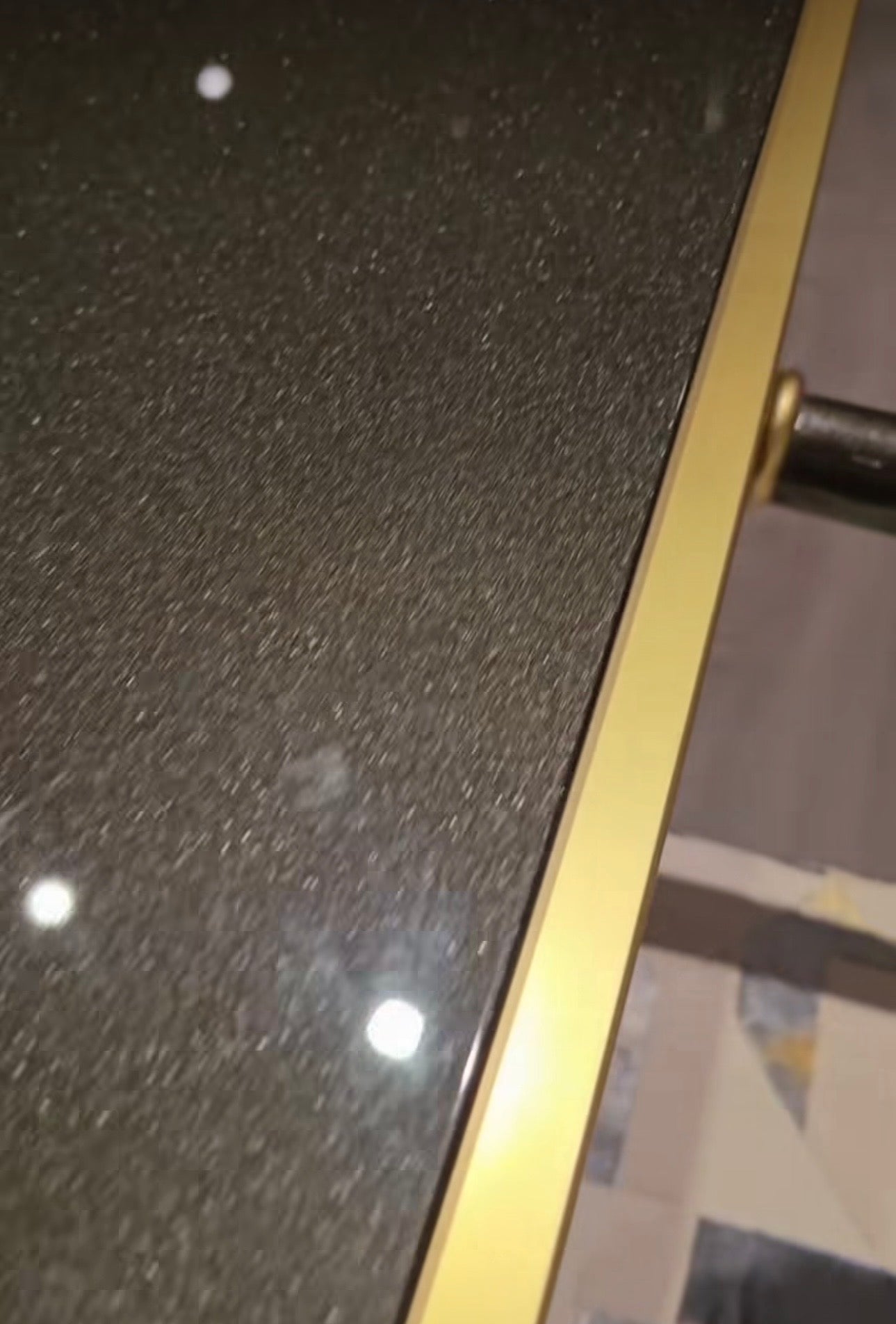 Monochrome modern luxury furniture collection featuring ivory curved sofa, black lacquer tables, and gold accent dining furniture.