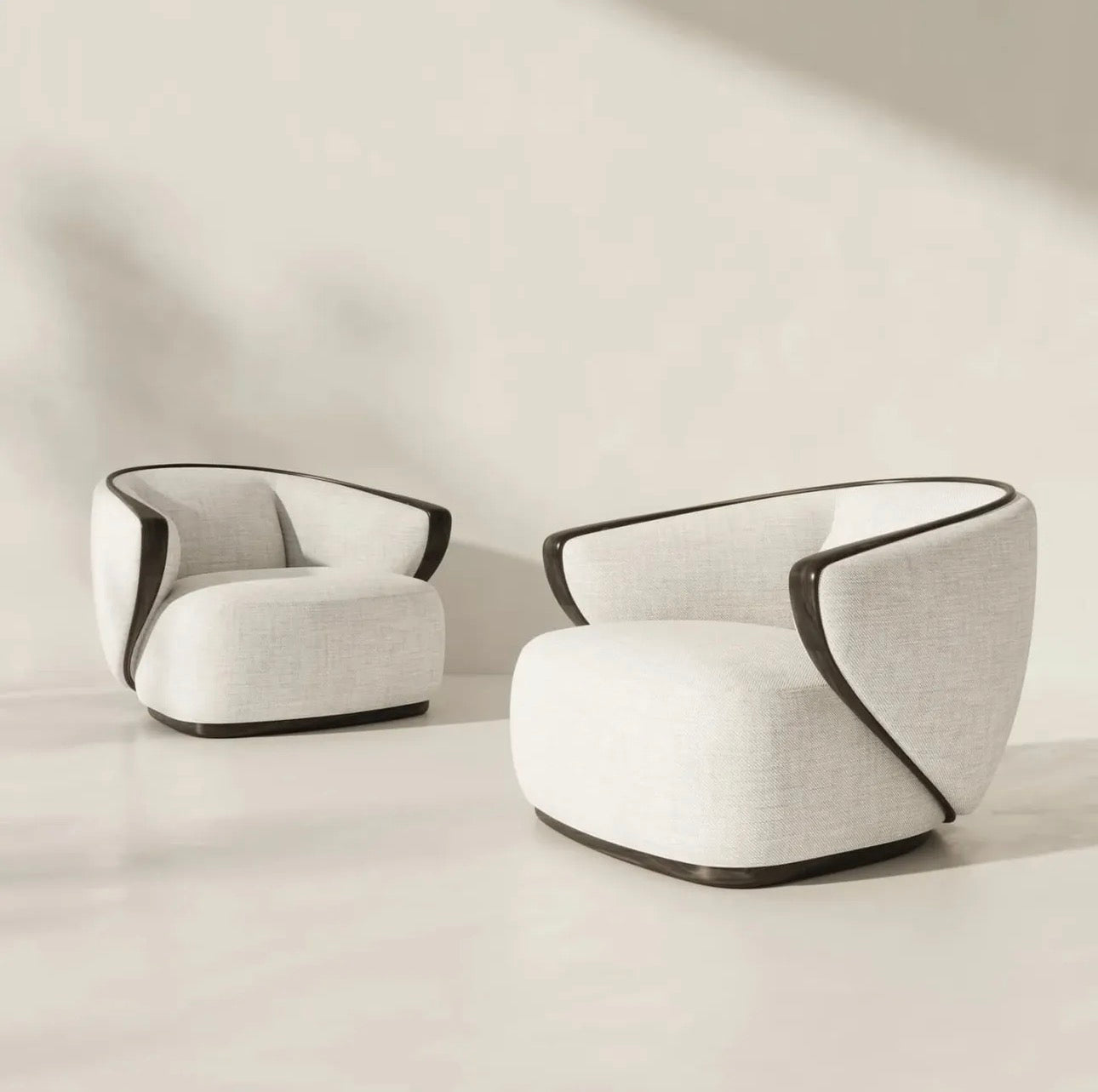 Calm luxury living and dining furniture collection with curved upholstered sofas, dark wood dining table, and elegant sideboard cabinetry.