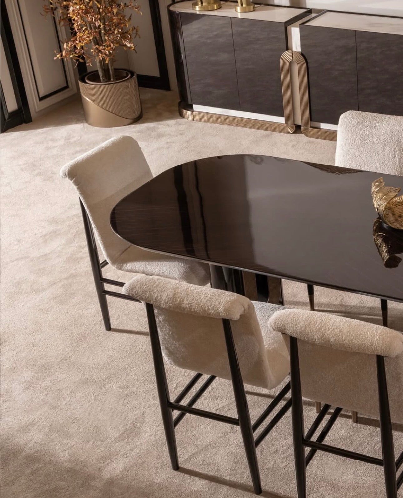 Apex luxury furniture collection with dark wood finishes, neutral seating, modern dining table, and high-end bedroom design.
