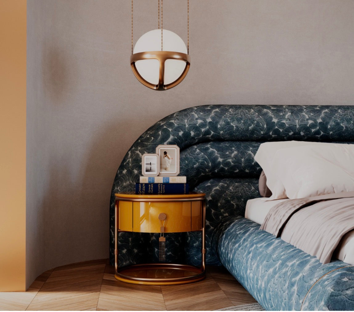 Tamar luxury furniture collection featuring sculptural upholstered bed, statement lounge chair, and modern wood vanity design.