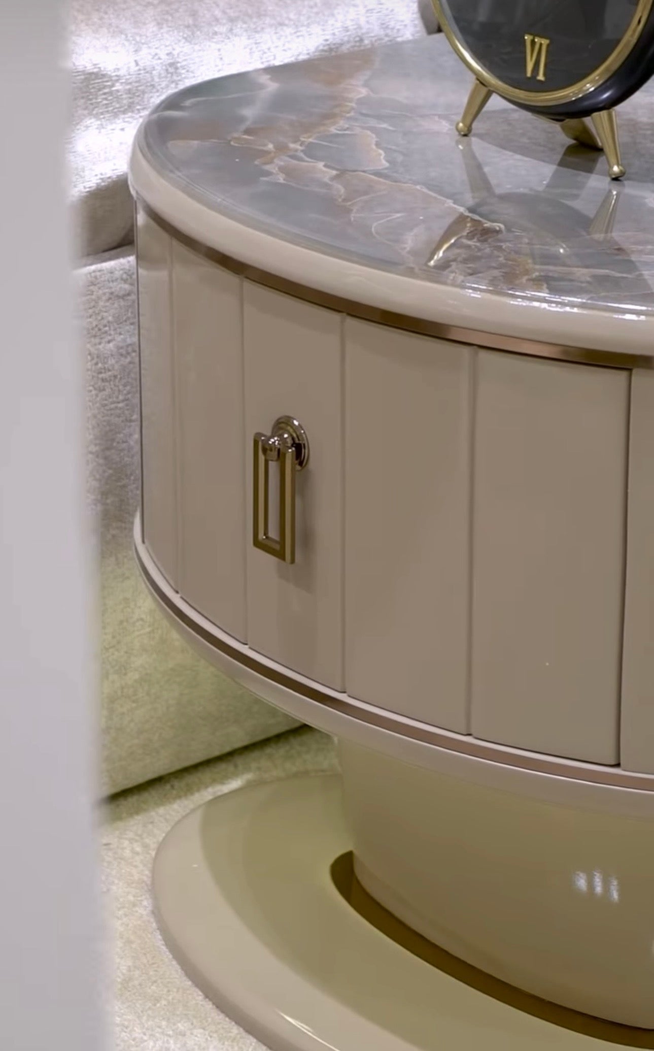 Crown luxury modern bedroom furniture collection with arched statement bed, marble dining table, mirrored wardrobe, and sculptural vanity.