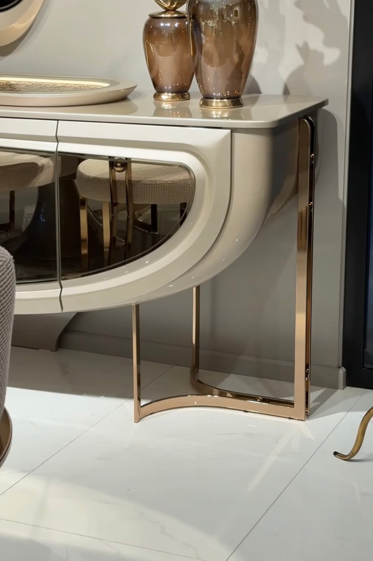 Heiroom luxury modern bedroom furniture collection with sculptural upholstered bed, mirrored console, and elegant vanity design.