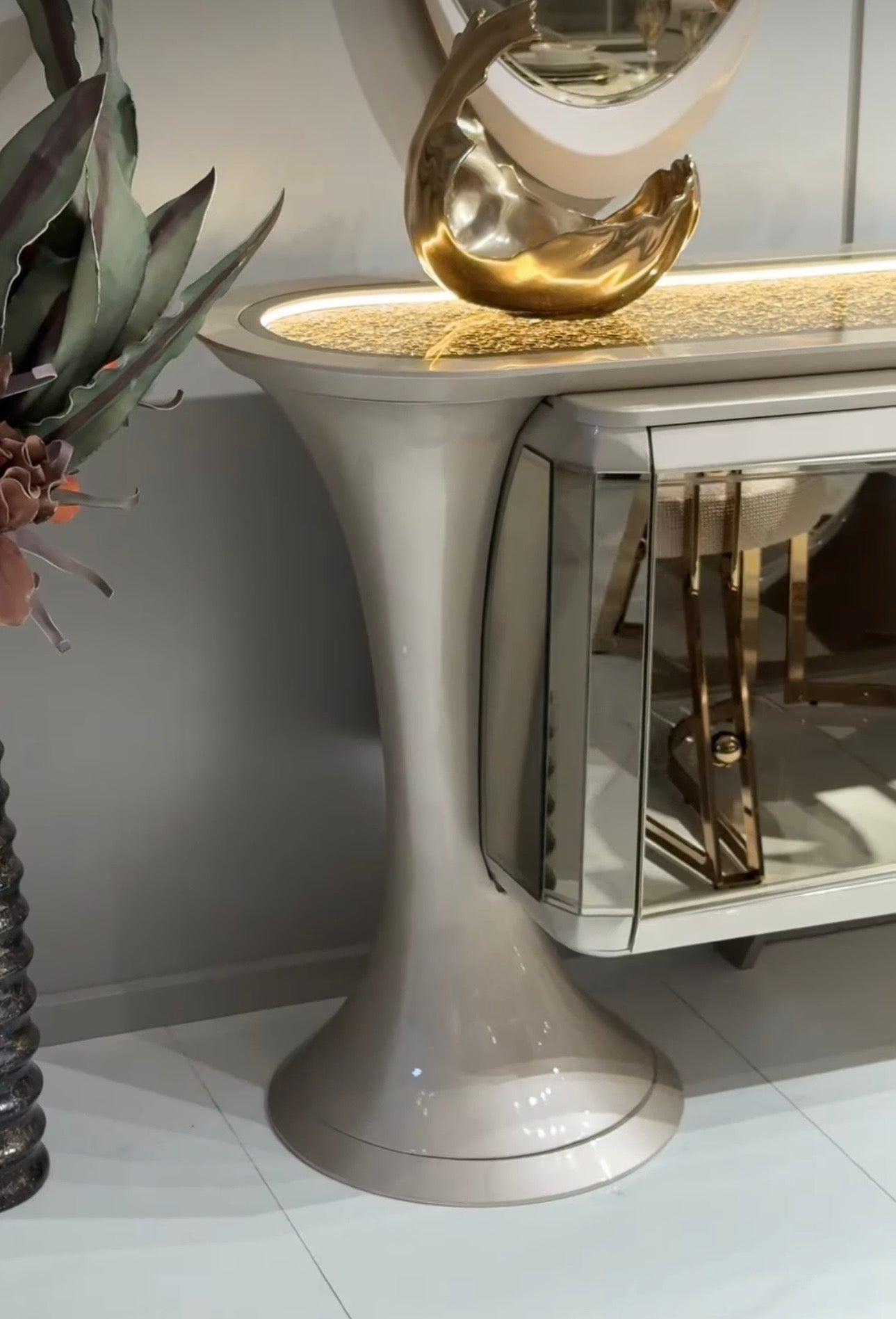 Heiroom luxury modern bedroom furniture collection with sculptural upholstered bed, mirrored console, and elegant vanity design.