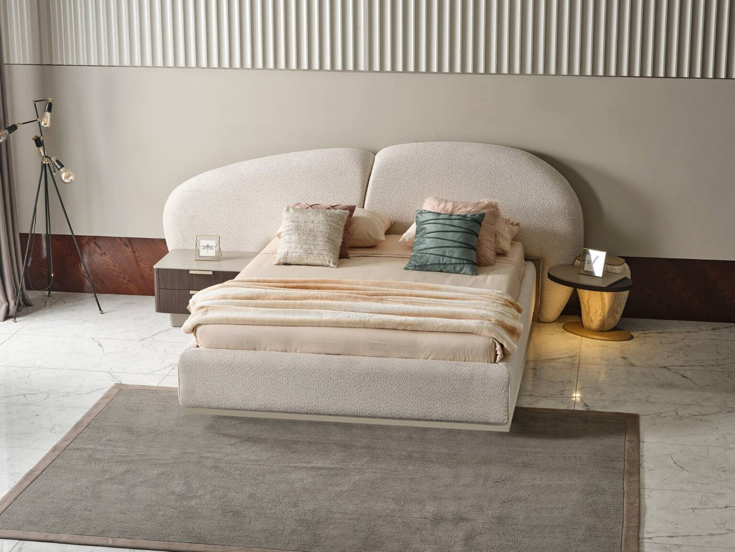Terrae modern luxury bedroom collection featuring upholstered bed, sculptural mirror vanity, and warm wood bedside tables in a serene minimalist space.