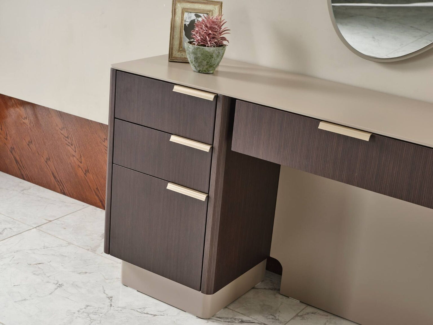 Terrae modern luxury bedroom collection featuring upholstered bed, sculptural mirror vanity, and warm wood bedside tables in a serene minimalist space.