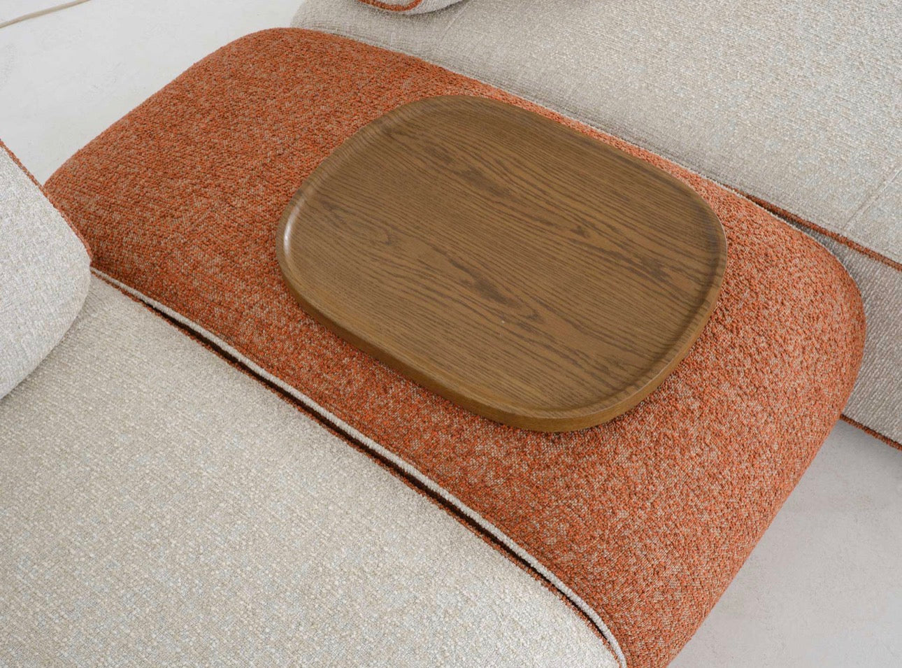 Blanc modern luxury living room furniture collection with curved modular sofa and sculptural wood coffee tables.