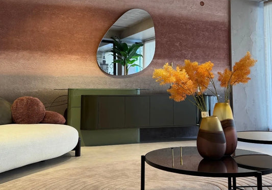 Honey modern luxury dining furniture collection with sculptural green dining table and tufted pedestal dining chairs.