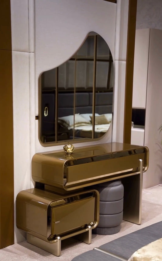 Aurelius luxury furniture collection with sculptural console, modern mirror, and metallic accent cabinetry.
