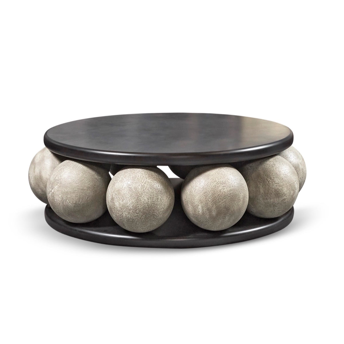 Panthera luxury furniture collection featuring statement sofa, sculptural coffee table, pedestal table, and modern shelving in dark finishes.