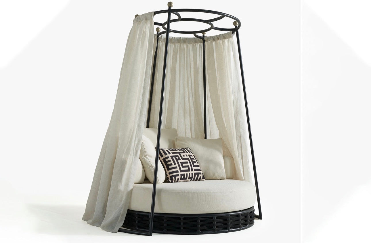 Sanctuarie luxury canopy lounge chair with draped fabric and deep cushioned seating