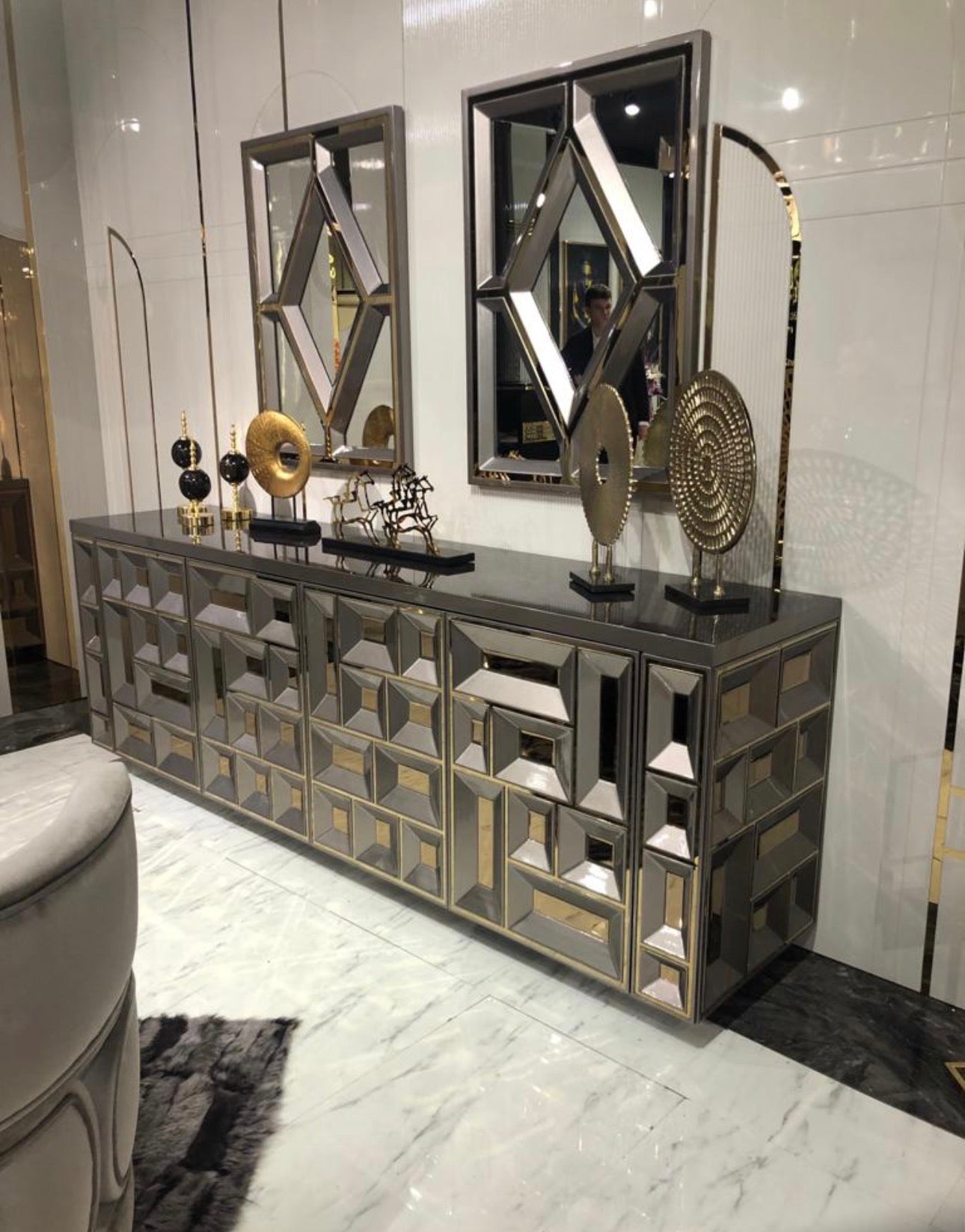 Pulse luxury furniture collection with geometric sideboard, sculptural seating, and modern living room design.