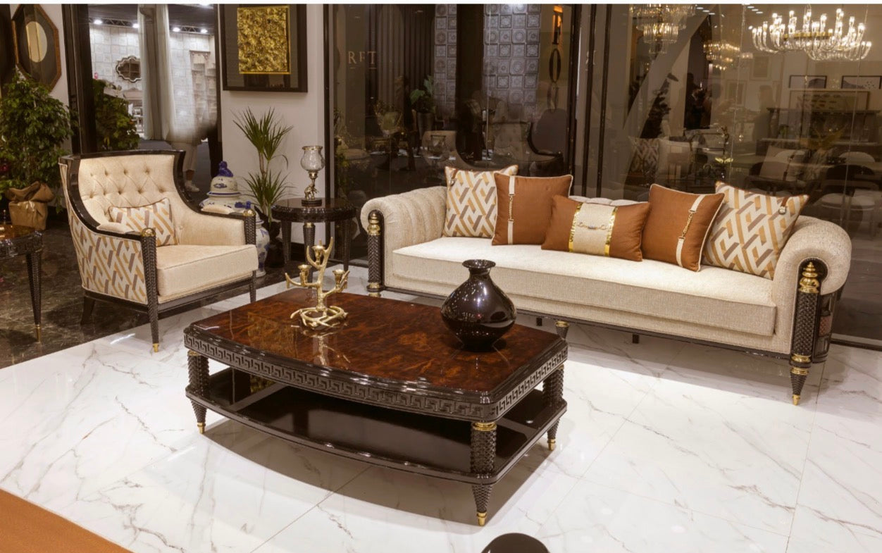 Valence luxury furniture collection with rich wood dining table, upholstered seating, and elegant living room pieces with gold accents.