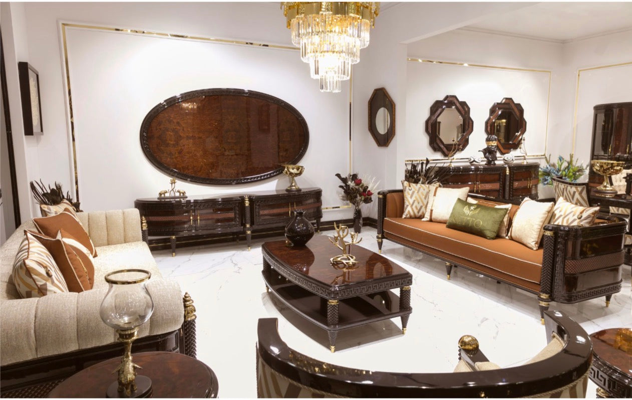 Valence luxury furniture collection with rich wood dining table, upholstered seating, and elegant living room pieces with gold accents.