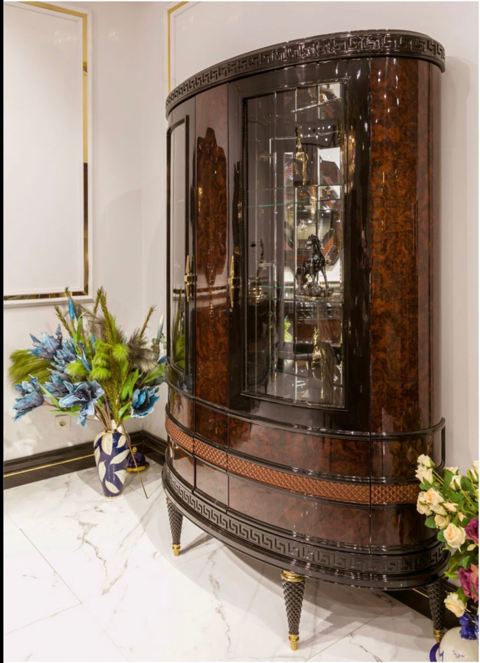 Valence luxury furniture collection with rich wood dining table, upholstered seating, and elegant living room pieces with gold accents.