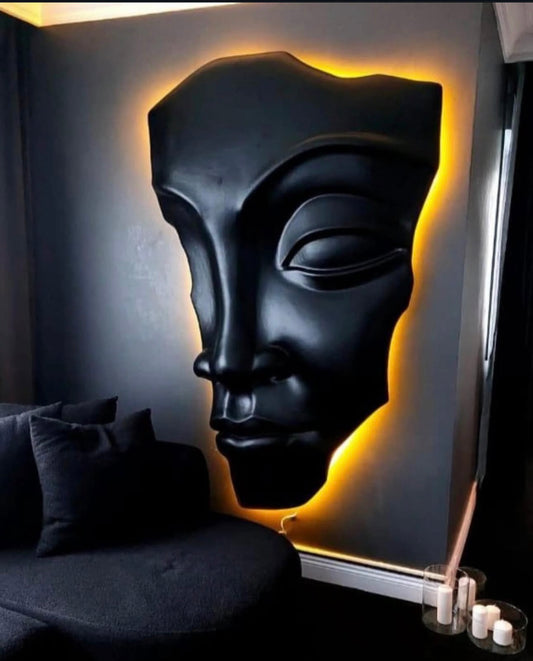 Roman sculptural wall art with illuminated backlit design creating a dramatic modern interior feature.