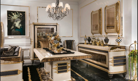Regalia luxury furniture collection featuring ornate gold living room seating and classic dining set with intricate detailing and black marble flooring.